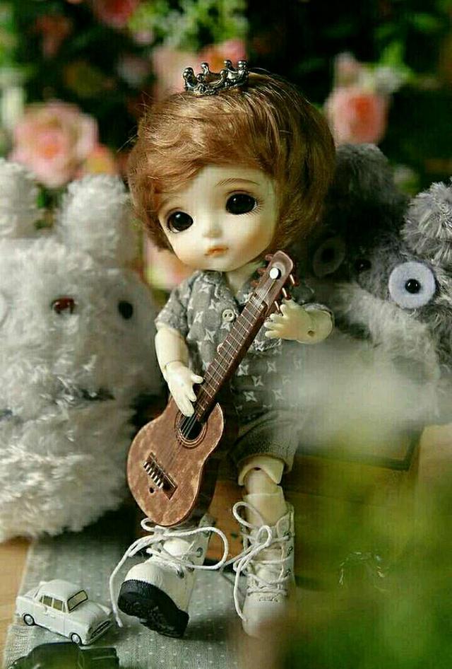 cute doll with guitar